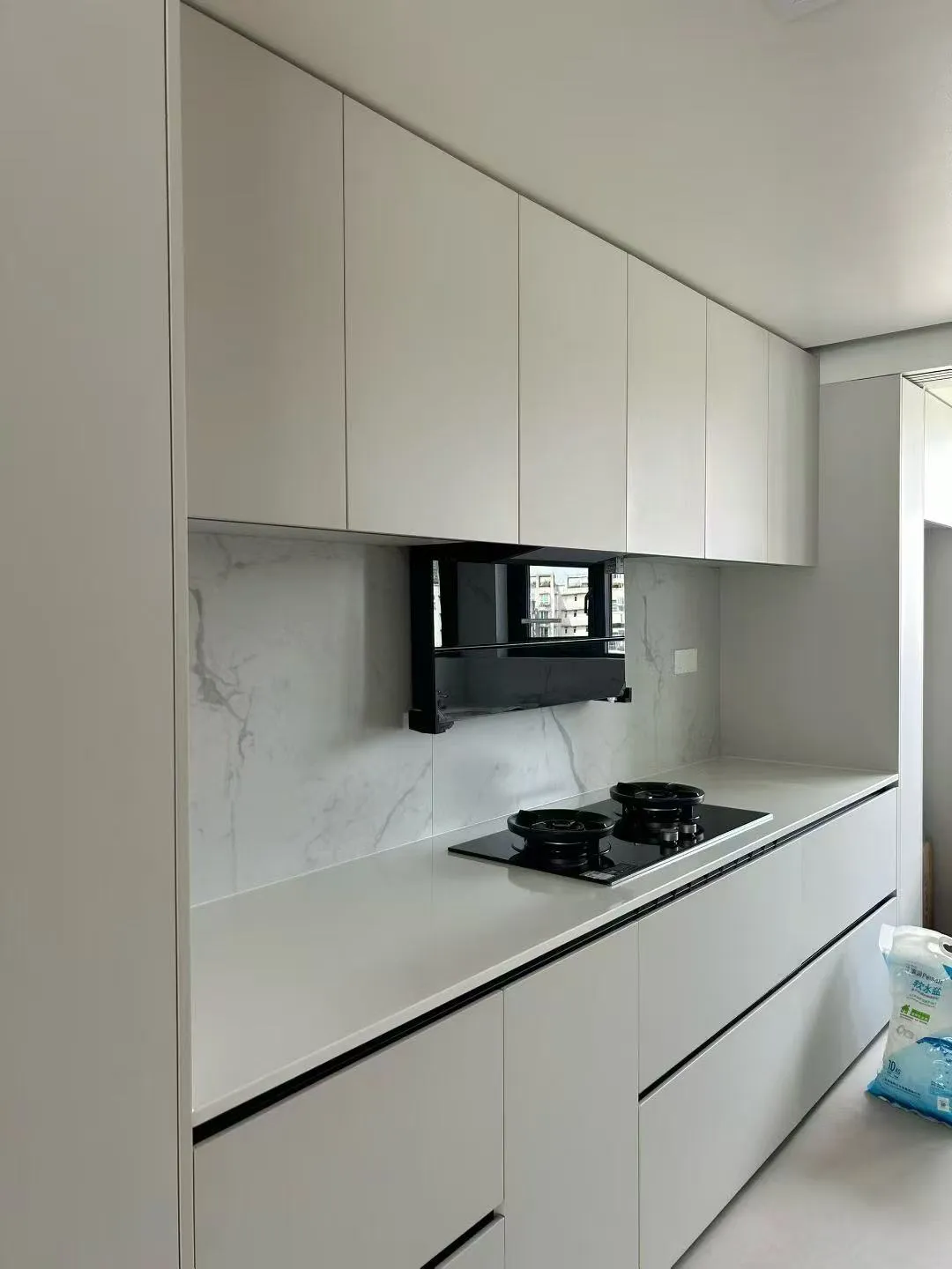 Modern Minimalist Kitchen with Marble Look Tiles